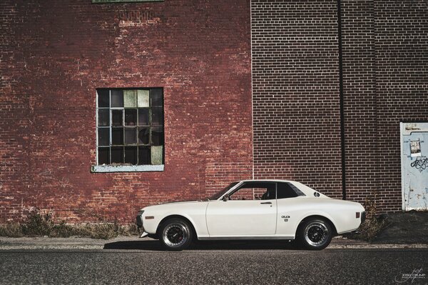 Antique car. White 1974 Toyota