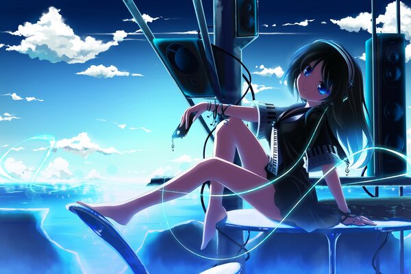 A girl sitting on a table with headphones on a blue sky background