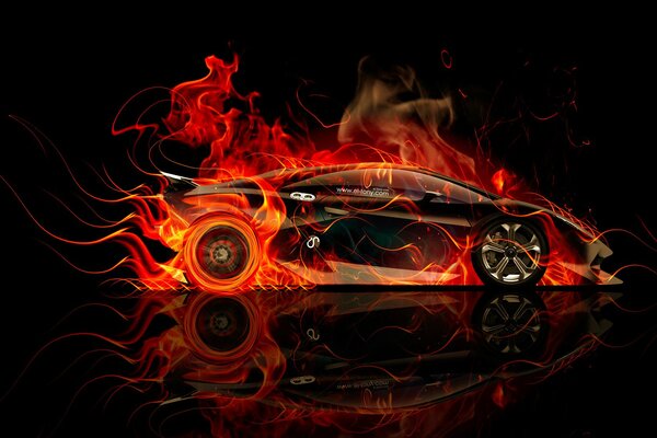 A car on a black background is on fire