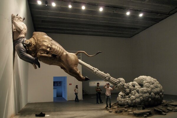 An unusual statue of a bull emitting gases