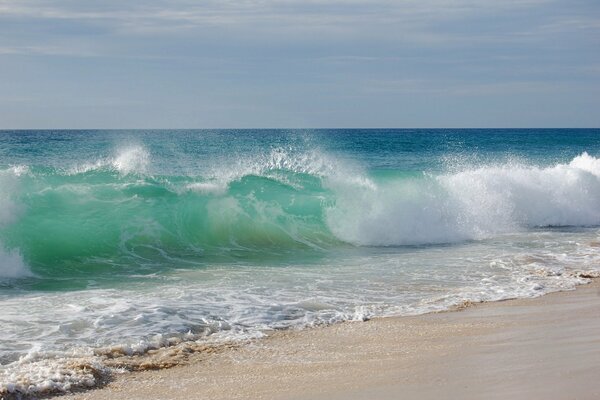 Sea waves on the sandy ocean floor