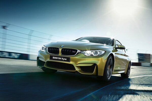 Light green BMW coupe f82 m4 2014 on the highway