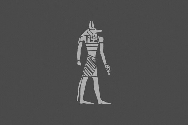 Ancient Egyptian deity on a gray background