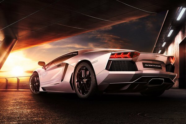 Lamborghini aventador sur fond de beau coucher de soleil