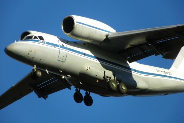 A heavy cargo plane in the sky without clouds