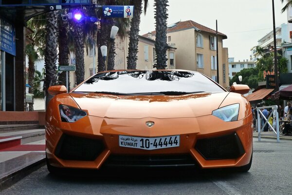 Orange sports car in the city