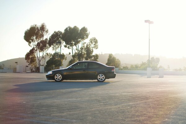 Black Honda Civic in clear weather