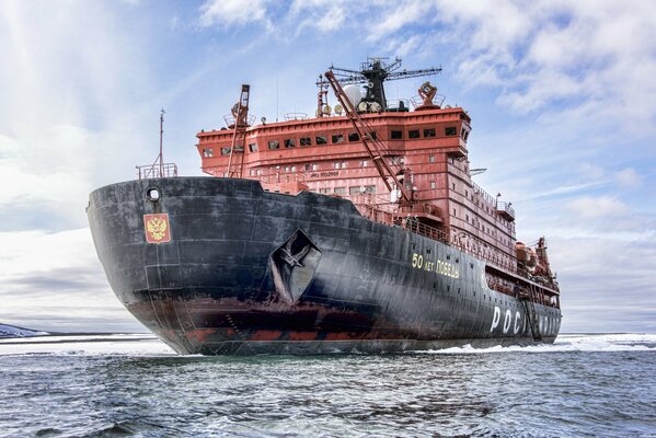 A huge icebreaker with the coat of arms of the Russian Federation