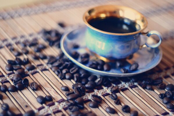 Composition of a cup of coffee and coffee beans