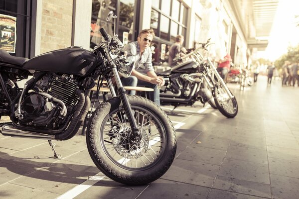 Honda motorcycle on the street at the summer cafe