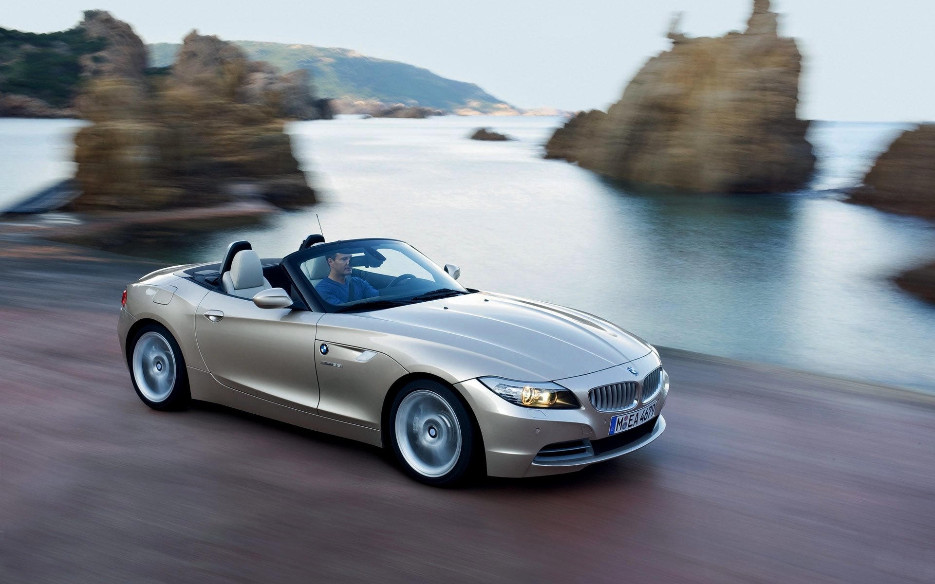 bmw z4 auto convertibile mare costa nel traffico rocce bmw