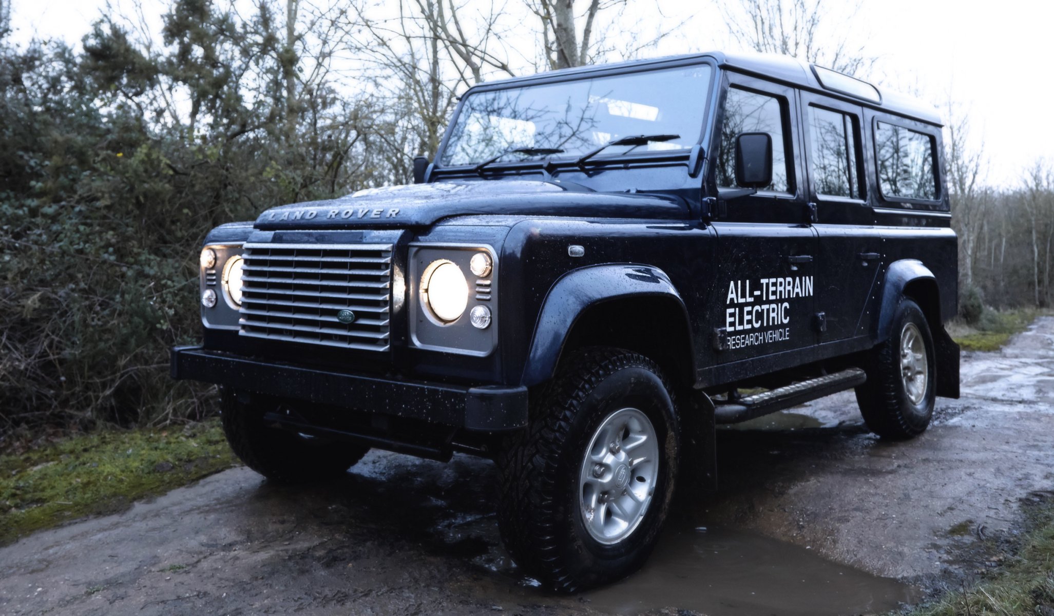 land rover defender suv car machine dirt rain light