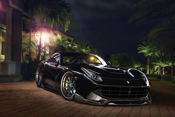 Black ferrari f12 berlinetta front view