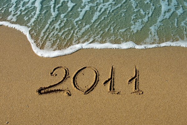 Año nuevo en el mar y la arena