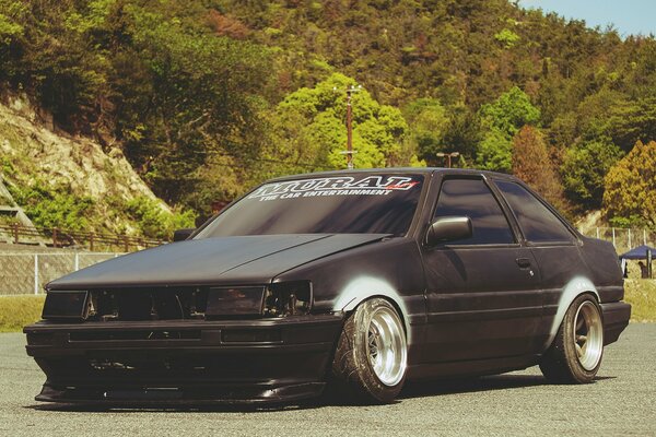 Black Toyota Corolla at the stadium