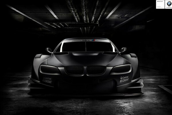 BMW black car on a black background