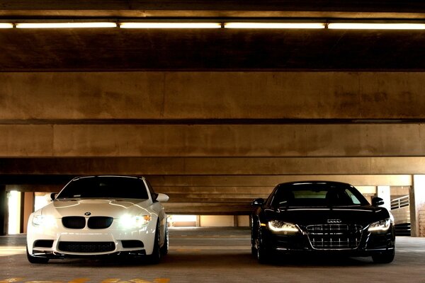 The confrontation of two Audi and BMW cars