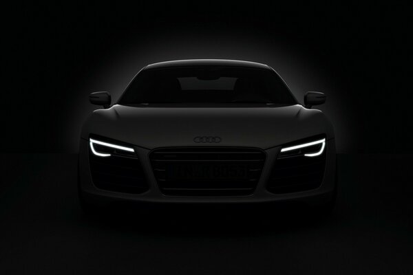 Audi in the dark. The car is an unusual photo. Beautiful car photo
