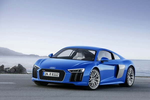 Picture of a blue car 2015 audi r8 v10