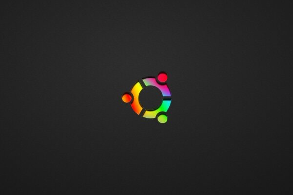 The emblem of a multicolored circle on a dark background
