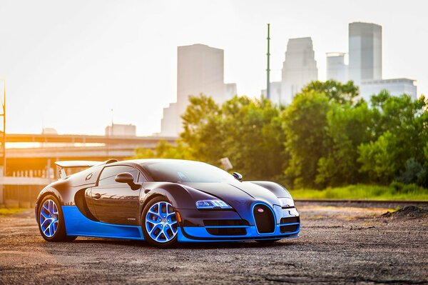 Magnificent Buggati Veyron against the backdrop of a big city