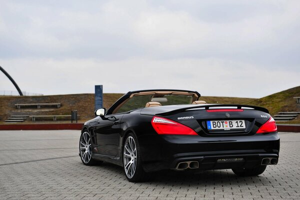 Rear view of a black convertible car