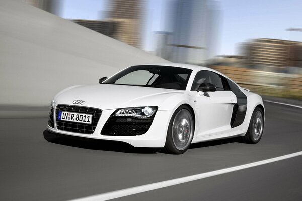 White Audi car in motion