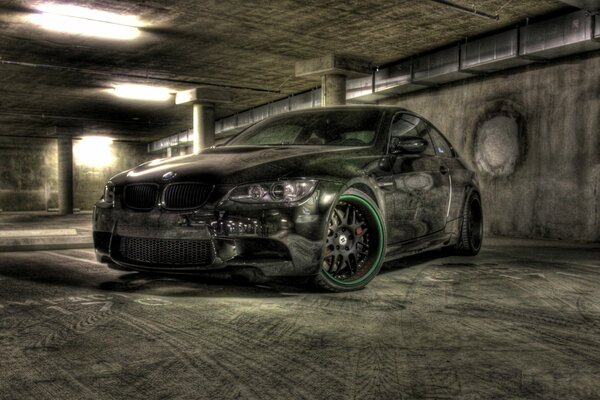 Bmw with wide wheels in the parking lot