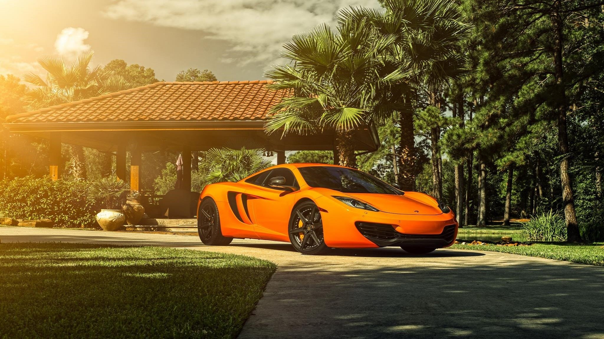 mclaren mp4-12c koła słońce przód supersamochód pomarańczowy