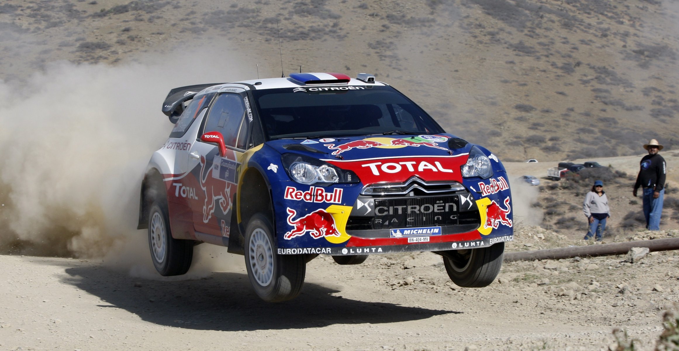 citroen ds3 rally rally S. loeb in the air flying dust shadow