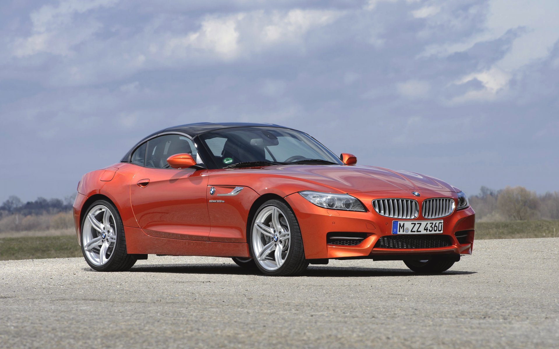 bmw z4 roadster auto bmw widok z boku kabriolet dzień cupe pomarańczowy