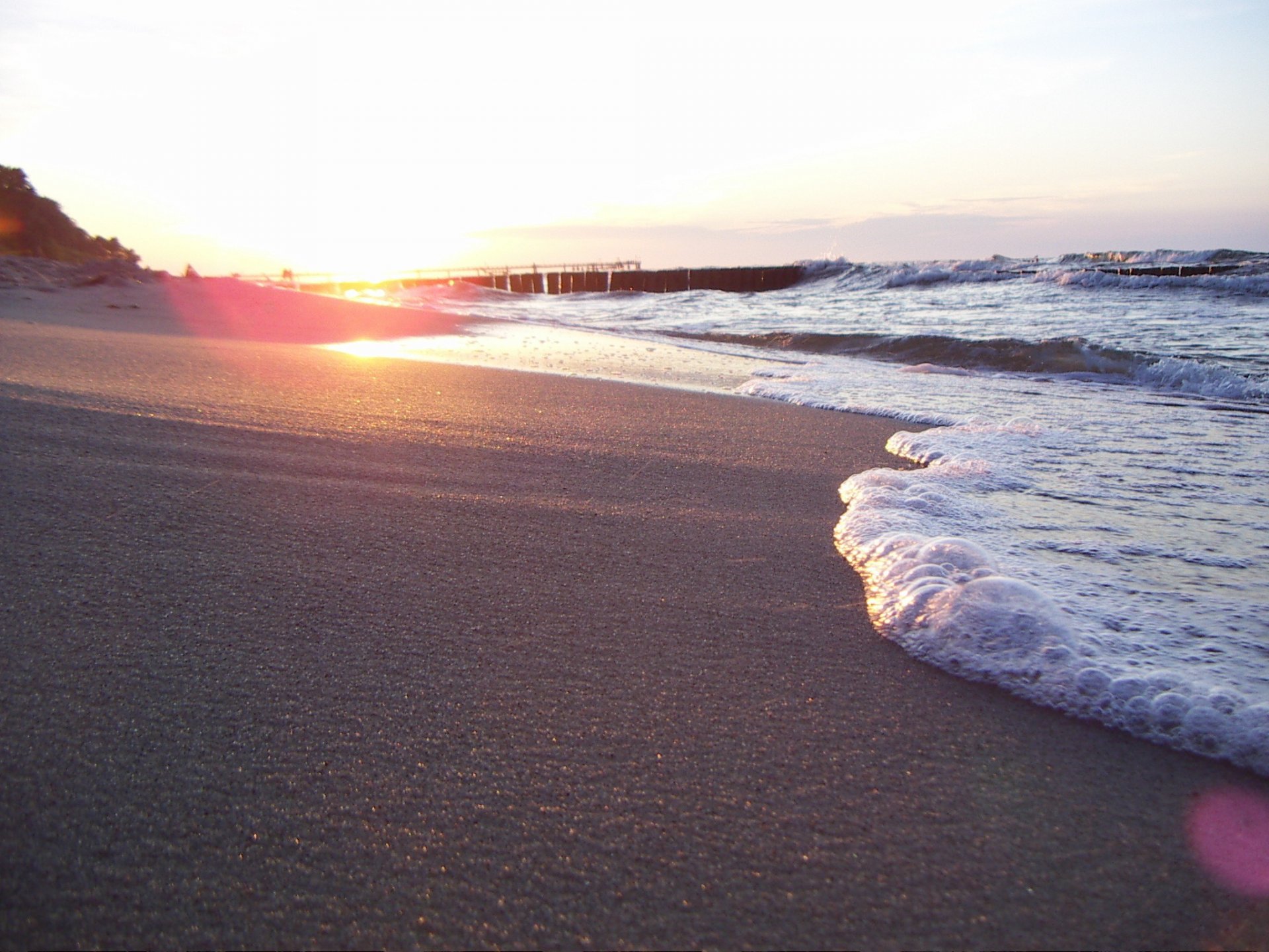 and nature wave summer light shore sea beach the sun foam water sunset the rays of the sun the reflection the evening