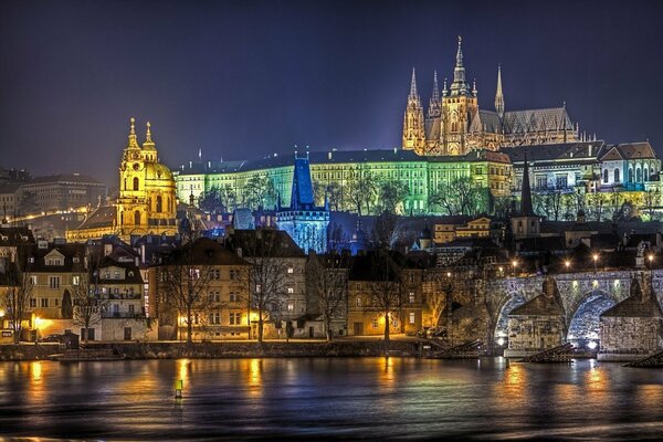 The ancient castle shines with architectural illumination at night