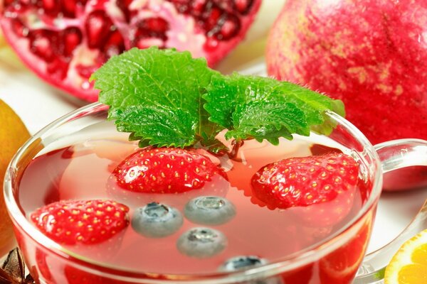 Fruit drink with strawberries and blueberries