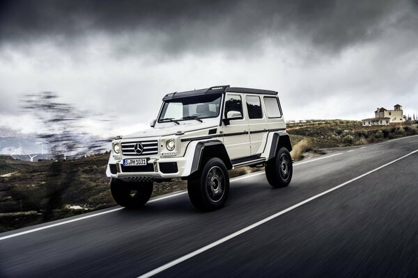 White Mercedes-Benz 4×4 on the road