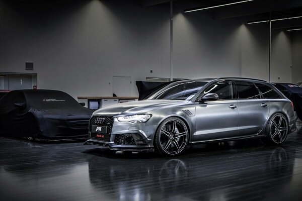 Audi 2015 avant in the garage by the light of lamps