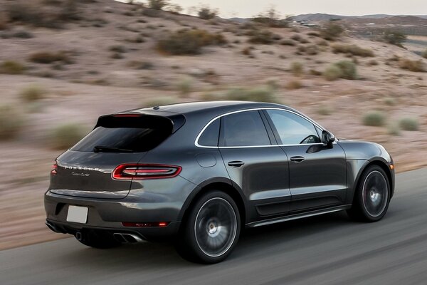 Porsche SUV speed road