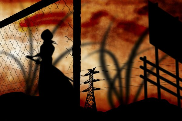 High-voltage tower at sunset girl at the fence