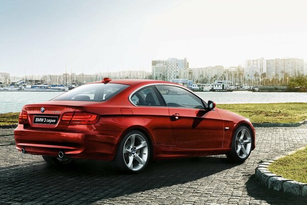 Urban landscape with a red BMW car