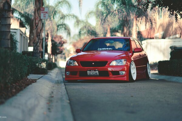 Red sports car on the road