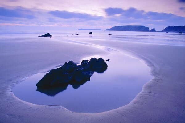 A calm sunset with a quiet sea