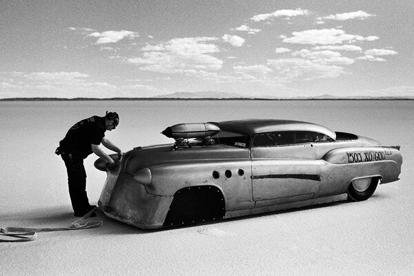 Sports car in the sandy desert
