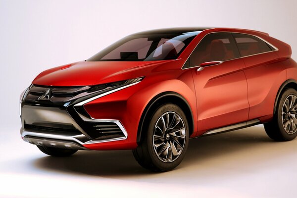 Mitsubishi de luxe rouge sur fond blanc