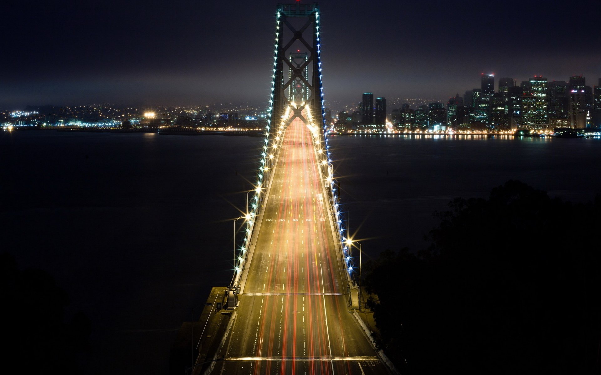 mig neberezhnaya bridge night city lanterns lights road height shutter speed movement speed water river night buildings city new york background city light