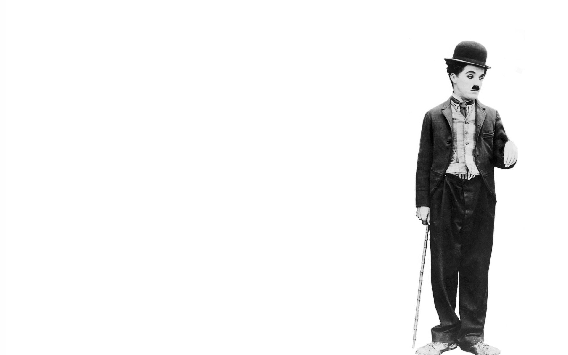 charlie chaplin charlie chaplin komik aktor kapelusz aktorzy filmowi białe tło twarz czarno-biały