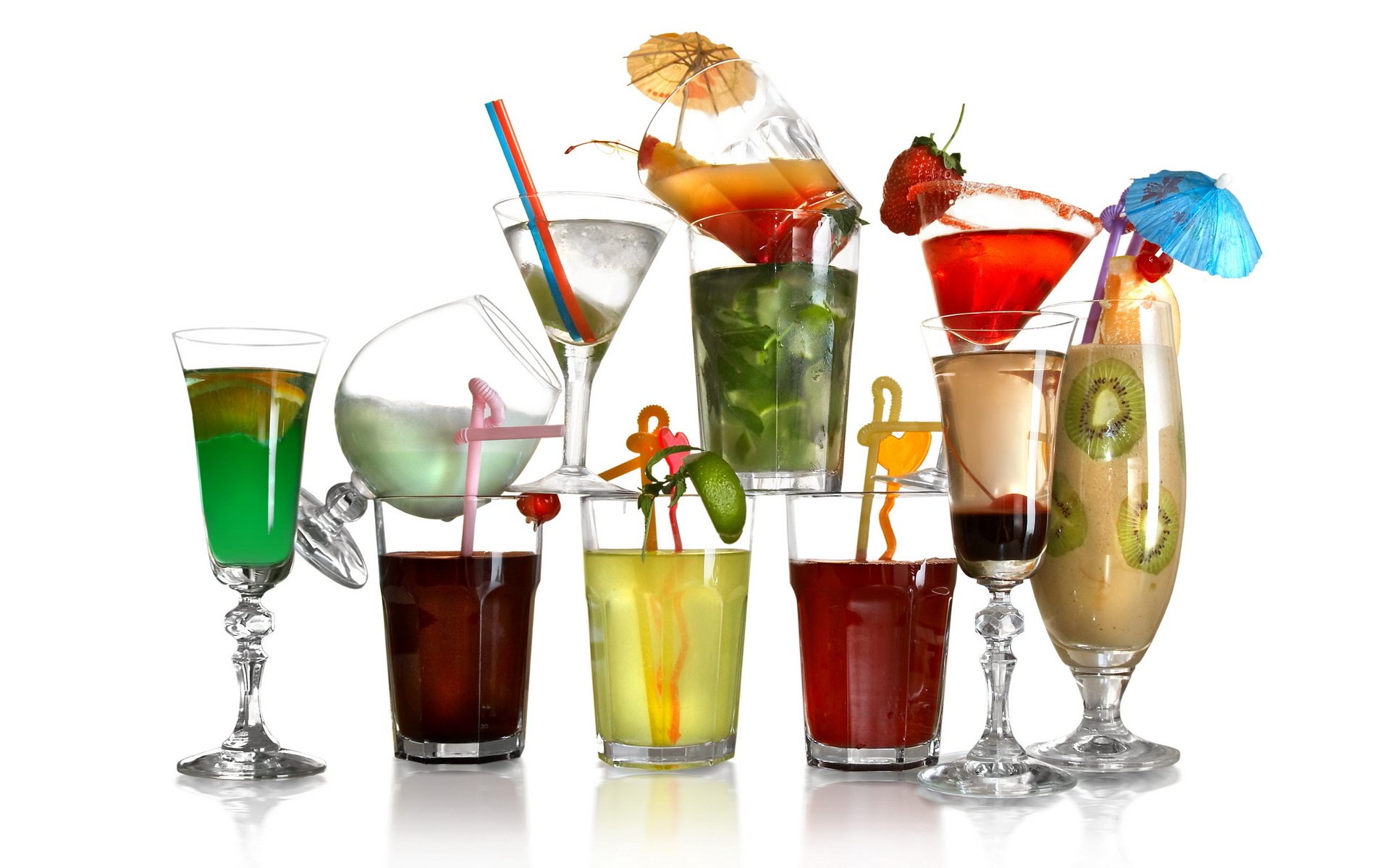 cocktails white background drinks glasses cuts fruit background tube umbrella