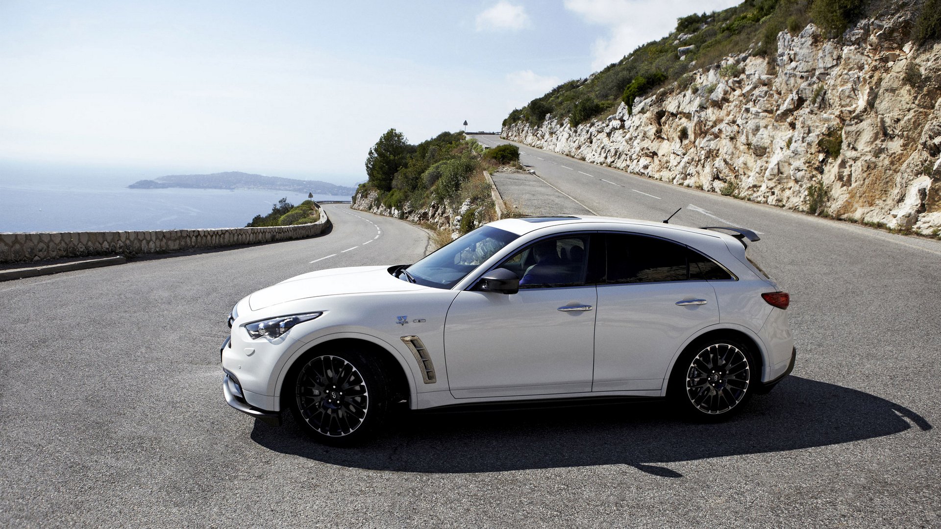 infiniti zitat fx50 vettel edition räder fließheck straße berge meer