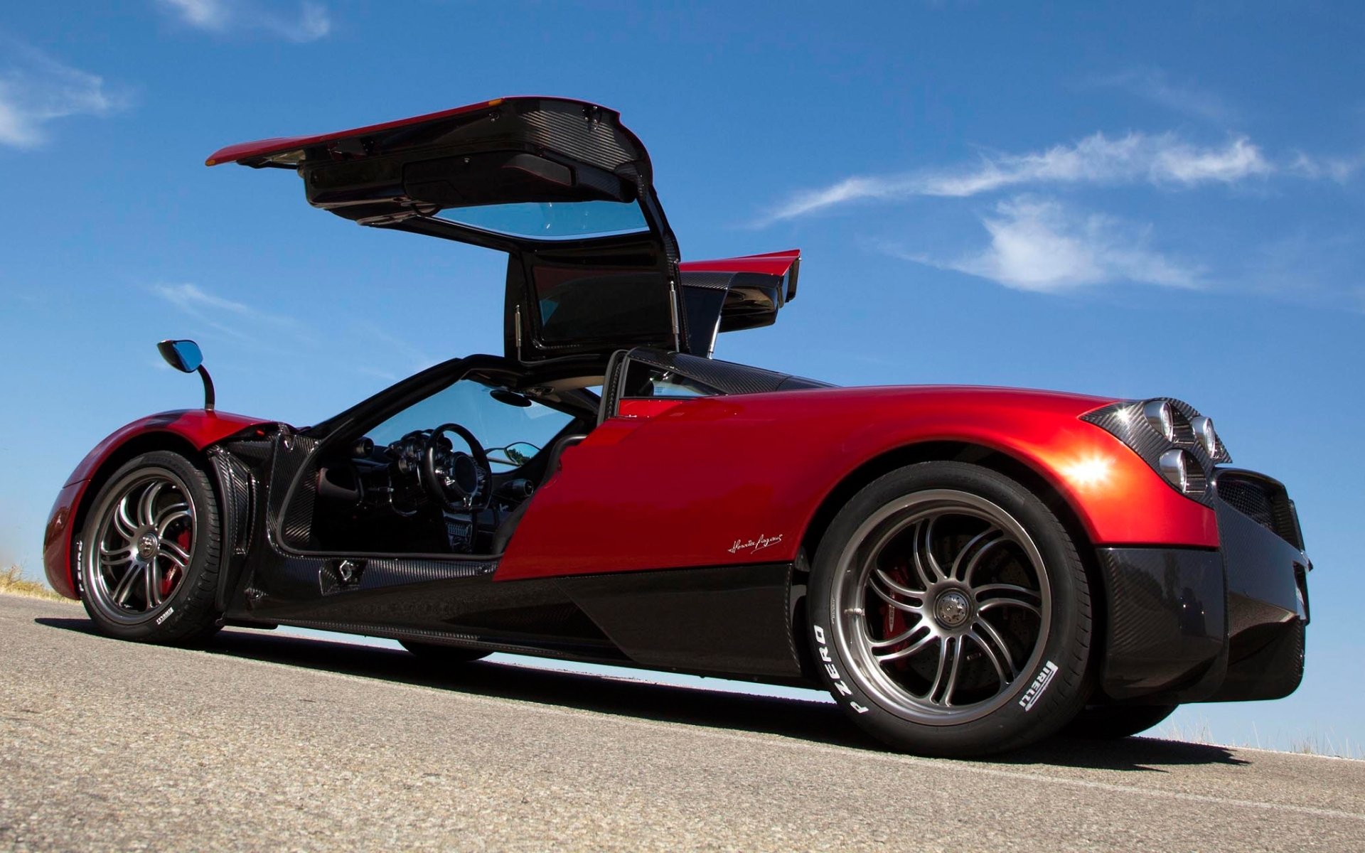 pagani huayra pagani huayra supercar red rear view doors sky