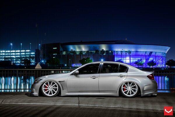 Infiniti G37 car landing, wheels gray color night city