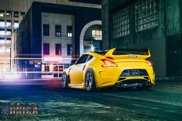 Sporty yellow Nissan in the city